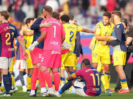image Las Palmas shock Barcelona 2-1 at the Estadi Olímpic Lluís Companys to spoil 125th Anniversary Party
