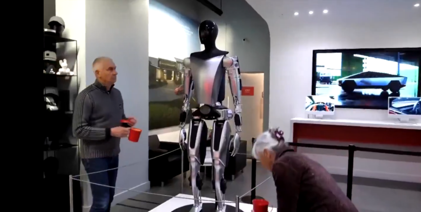 Vandalizing Optimus Robot In The UK Tesla Showroom