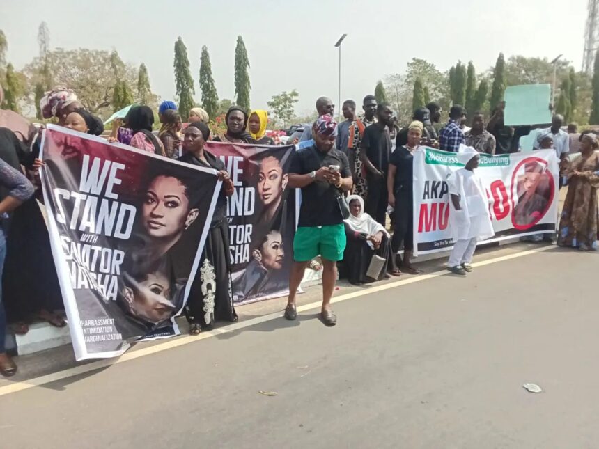 Senator Akpoti’s Supporters Storm NASS, Ask Akpabio To Step Down, Over Sexual Allegation And Abuse Of Office