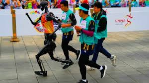 World First Humanoid Robot Vs Human Half-Marathon In Beijing