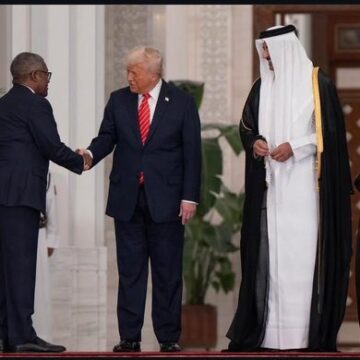 Photo: “The Richest Black Man In The World Shaking Hands With The Most Powerful Man In The World” Otedola Says Of Dangote Shaking Hand With U.S. Trump