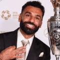 Mo Salah Balances Dad Duties With Sense Of Humor, Regales People With His Children’s’ Fight Over His Trophies During PFA Behind The Scene Shoot