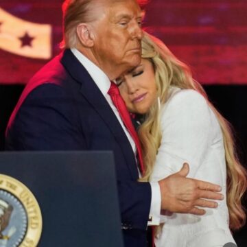 WhatsApp Image 2025-09-22 at 09.36.06_69317976 President Trump Calls Charlie Kirk Widow’s Out On The Stage, Gives Her A Comforting Hug, Thereafter Pointed To The Sky, Gesturing To Charlie.