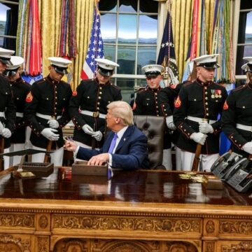 WhatsApp Image 2025-09-25 at 14.32.35_91554c15 Trump Welcomes The Elite Marine Corps Silent Drill Platoon To The Oval Office, Presents Each Member With A Presidential Challenge Coin