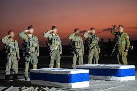 image Israel Defense Forces Reveals “Two coffins of deceased hostages, escorted by IDF troops, crossed the border”