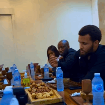 Following His Recent Fight In Lagos, British-Nigerian Boxer, Moses Itauma And His Crew, Visit Ile Iyan HQ For A Sumptuous Nigerian Meal