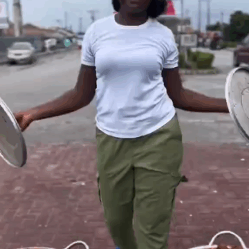 image Video: Nigerian Lady Serves Her Community, Uses Her NYSC Allowance To, Unite The People Through Food