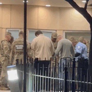 Video: National Guard Members Spotted Praying Together Outside The DC Hospital Where Their Fellow Soldiers Are Fighting For Their Lives