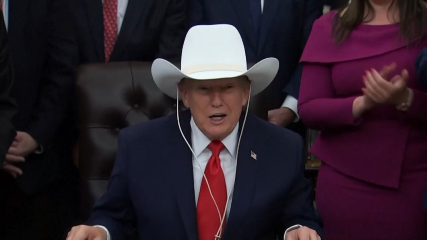 Captain Of The 1980 “Miracle On Ice” USA Olympic Hockey Team That Upset The Soviets, Proudly Presents Trump With A Team Hat.