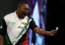 image Kenyan President William Ruto Excited At David Munyua Heroics At The Paddy Power World Darts Championship.