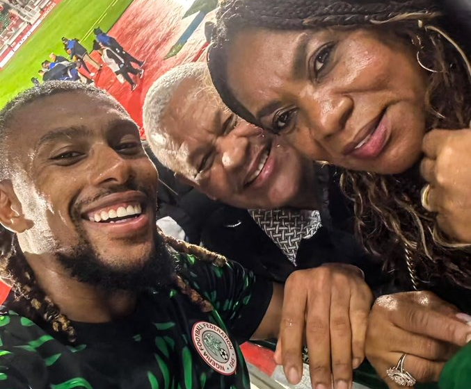 Alex Iwobi Poses With Parent After Delivering An Astonishing Performance For Nigeria Against Tanzania In The AFCON