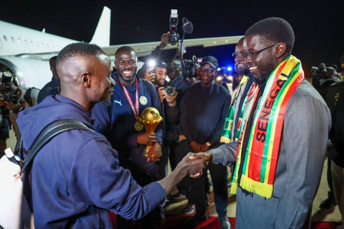 Senegal President Bassirou Diomaye Diakhar Faye, Welcomes The Lions Of Teranga Back Home, At The Blaise Diagne International Airport, As The Team Return With Their AFCON Trophy