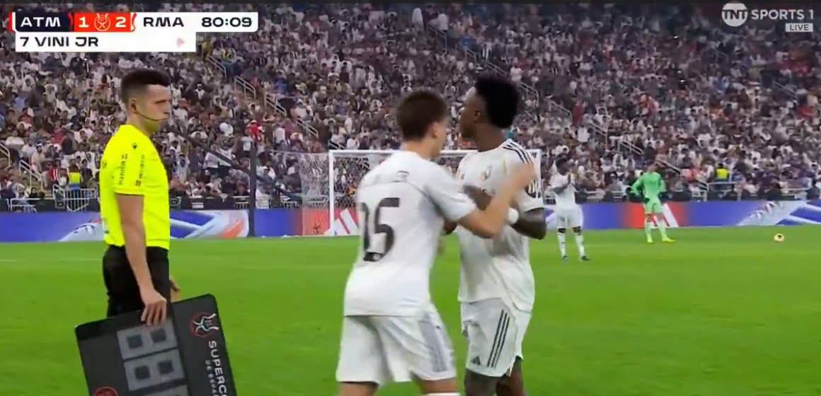 Vini Jr. Being Restrained By His Real Madrid Teammates On Thursday Night, After Atletico Manager Simeone Taunts The Brazilian During A Heated Supercopa De Espana Semi-Final.