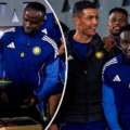 Al Nassr Captain Cristiano Ronaldo, In A Playful Mood Hug His Team Mate, Senegalese Sadio Mane Whose Country Beat Morocco To Win The AFCON Trophy