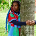 Kenyan Truphena Muthoni Set The Record For Longest Marathon Hugging A Tree With A Total Of 72 Hours, Guinness World Record Announces.