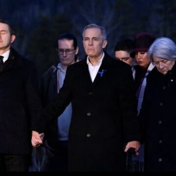 Photo News: Prime Minister Carney And Leader Of The Opposition Hold Hands To Grieve During A Memorial Service For The Victims In Tumbler Ridge  British Columbia.