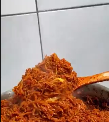 The Making Of Smoky Nigerian Jollof Rice