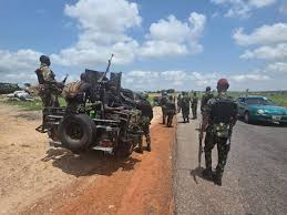image Military troops apprehend a vehicle carrying what is suspected to be ISWAP supplies.