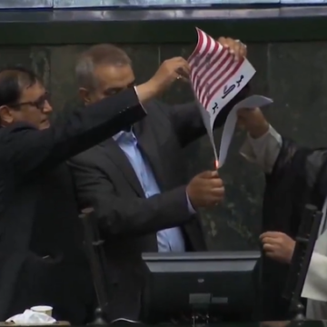 image Iranian Lawmakers At The Parliament Set U.S. Flag On Fire While Chanting “Death To America.”