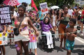 image Women’s Day Marches In Brazil Decry Gender-Based Violence, Fueled By Alleged Gang Rape In Copacabana