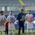 Iran National Football Team Holds Tiny Backpacks In Tribute To Slain Minab Schoolgirls, During The National Anthem Before Kickoff Vs Nigeria