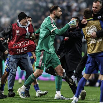 Sport Story: Goal Keeper Gianluigi Donnarumma Being Held Back At Full-Time After Italy Failed To Qualify For The World Cup For A Third Straight Time
