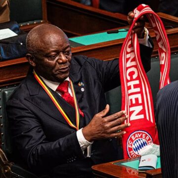WhatsApp Image 2026-04-17 at 10.59.13 AM (1) Sport Photo News: Vincent Kompany FC Bayern’s Manager’s Father Pierre Kompany Turnes Up To The Brussels Parliament In Belgium With A Bayern Scarf