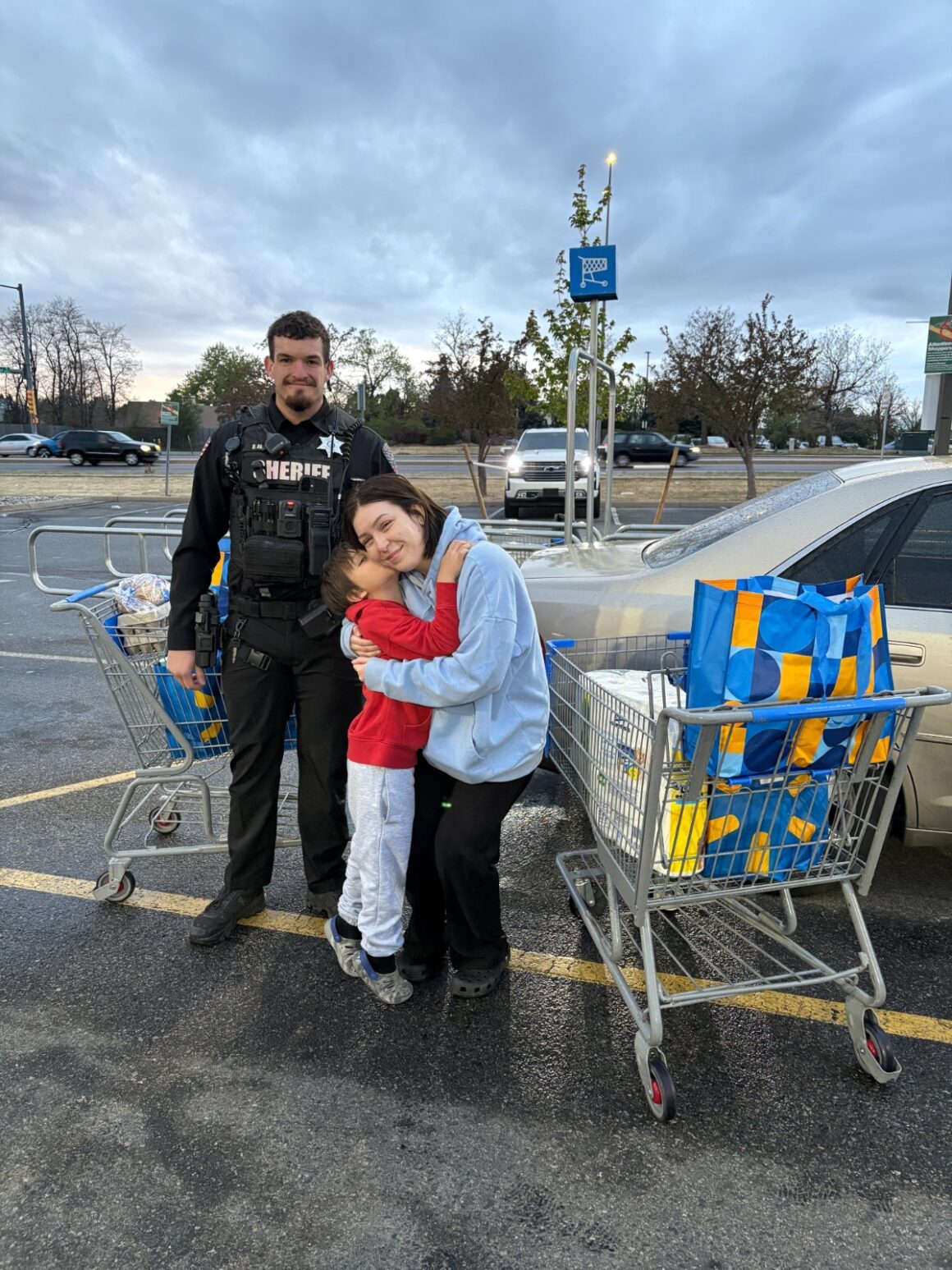 The Office Of The Arapahoe Sheriff Colorado Responds To A Distress Call From A Single Mother, Provide Groceries For Mother And Help To Restore Power
