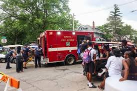 image Police Search For Suspects In Ohio Shooting That Wounded 12 Near A Street Festival